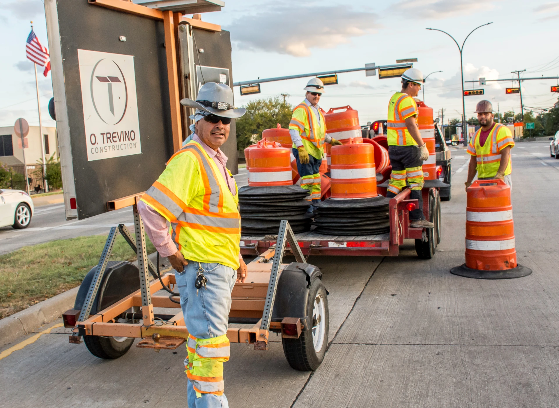 Road crew with safety vests and cones